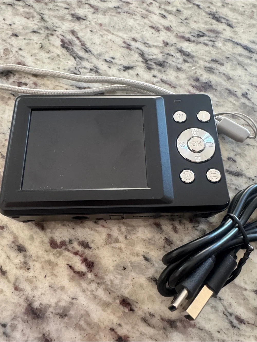 Compact Black Digital Point-and-Shoot Camera with USB Cable
